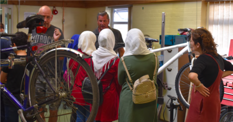 CRRC beneficiaries participating in a bicycle maintenance training at OWL Bikes, part of
Papworth Trust Cambridge