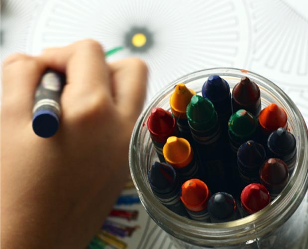 Generic background image of a hand drawing with crayons